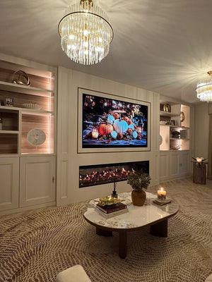 Round ceramic coffee table with white stone-look surface and dark walnut legs, centered