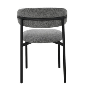 A modern dining chair with a textured gray fabric upholstered seat and backrest, supported by a slim black metal frame, shown against a plain white background.