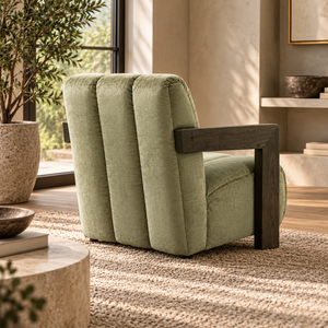 Henry Sage Armchair in muted green upholstery with channel back and dark wood arms