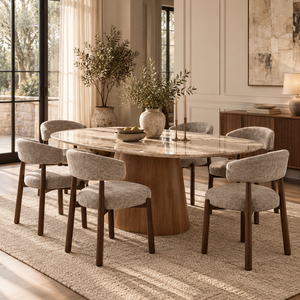 Dining chairs in walnut with light gray upholstered backs and seats