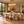 Cloud White Micro Cement Oval Dining Table & Abel Walnut Dining Chair Set