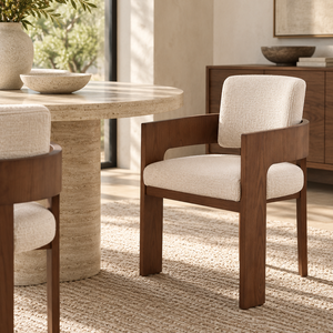 Walnut dining chair with beige fabric seat, rounded corners, and armrests