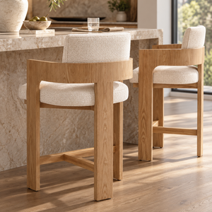 Light oak barstool with cream upholstered seat and back, open lattice support frame