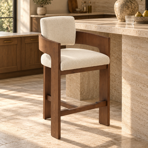 Walnut wood barstool with cream upholstered back and seat, front view with footrest