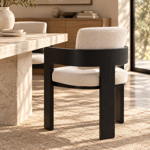 Cream fabric dining chair with rounded dark wood back and arms