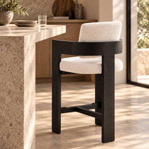 Black wood barstool with cream upholstered seat and backrest
