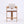 A modern wooden bar stool with a light beige upholstered seat and backrest, shown against a plain white background.