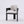 A modern accent chair featuring a black wooden frame and light beige textured fabric upholstery on the seat and backrest, set against a plain light gray studio background.