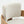 Close-up of a modern chair showing a curved light beige textured fabric backrest and seat, paired with a natural oak wood frame, on a white background.