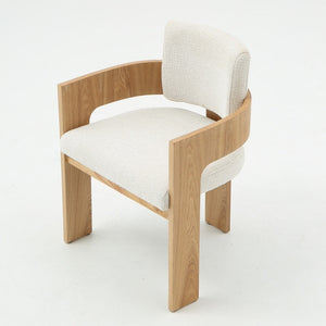 A modern accent chair featuring a light natural wood frame and off-white textured fabric upholstery, shown on a seamless white studio background.