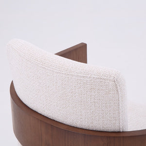 Close-up of a curved wooden chair with a textured off-white fabric seat and back cushion, shown against a plain white background.