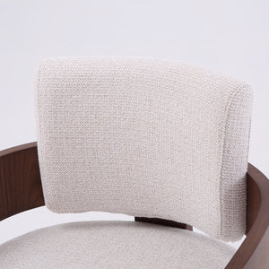 Close-up of a modern chair featuring a curved dark brown wooden frame and a textured light beige fabric cushion.