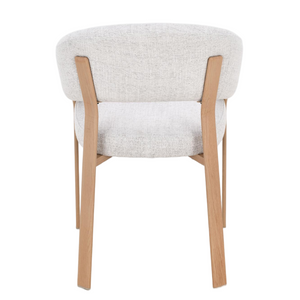 Upholstered dining chair with light gray seat, curved back, and angled oak legs