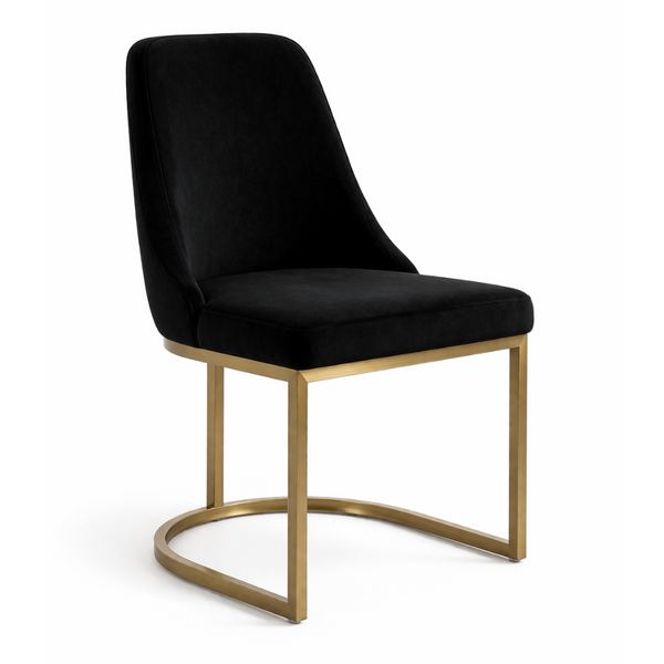 Black upholstered chair with gold metal legs on a white background