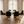 Luca White Marble Dining Table with Faith Black Velvet Gold Chairs Fully Set Front View