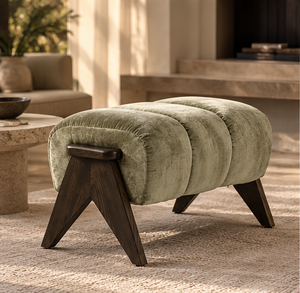 Henry Sage stool in angled view, showing its three-part cushion and angled wood legs