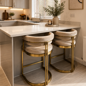 Modern kitchen with a island and gold bar stools